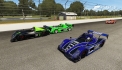 nSmokez420 (light green) pushes iMaHiGhFlYeR (Monster) past BCKracer71 (blue) on the final lap.